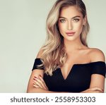 Young, blonde haired woman with wavy hair .Beautiful model with long, hairstyle