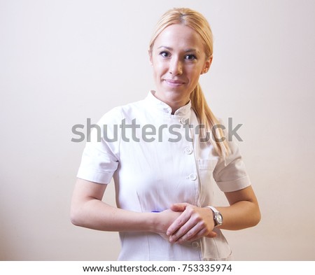 young blonde nurse taking