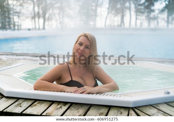 Outdoor bathroom blonde woman