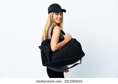 Young Blonde Woman Holding A Sport Bag Over Isolated White Background