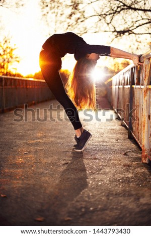 Similar – beautiful young woman having fun outside in park