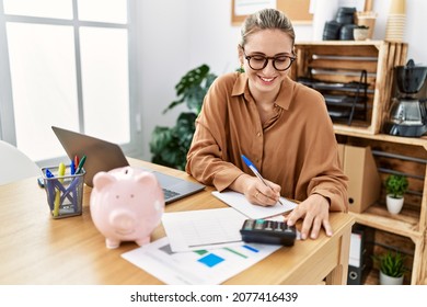 Young blonde woman smiling confident working at office