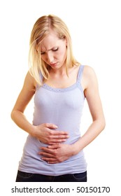 Young Blonde Woman With Stomach Ache Holding Her Belly