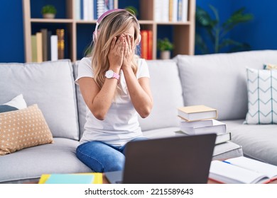 Young Blonde Woman Studying Using Computer Laptop At Home Rubbing Eyes For Fatigue And Headache, Sleepy And Tired Expression. Vision Problem 