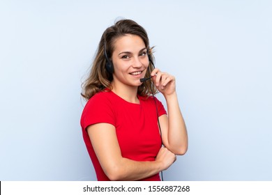 Young Blonde Woman Working With Headset