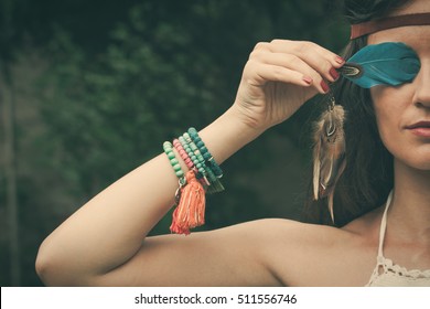 Young Bohemian Fashion Style Woman With Feather Portrait Closeup