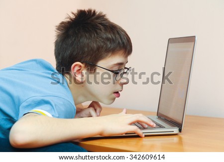 Young boy addicted to computer