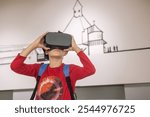 A young boy in augmented reality glasses explores an interactive museum exhibit, merging technology with education. This setup enhances learning, sparking curiosity through immersive, hands-on STEM ex