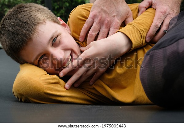 Guys being tickled by guys
