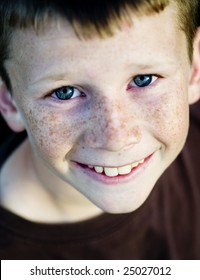 Young Boy With Blue Eyes Smiling