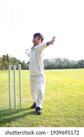 Young Boy Bowling Leg Spin In A Cricket