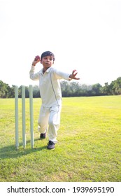 Young Boy Bowling Leg Spin In A Cricket