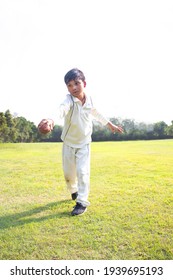 Young Boy Bowling Leg Spin In A Cricket