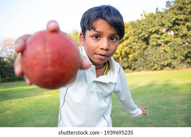 Young Boy Bowling Leg Spin In A Cricket