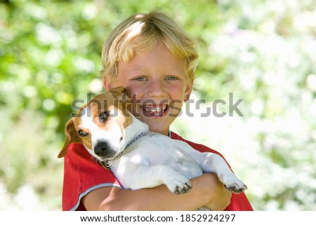 Similar – Foto Bild Junge und sein Hund rennen einen Hügel hinauf