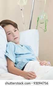 Young Boy Child In A Hospital Bed