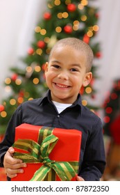 Young Boy With Christmas Gift