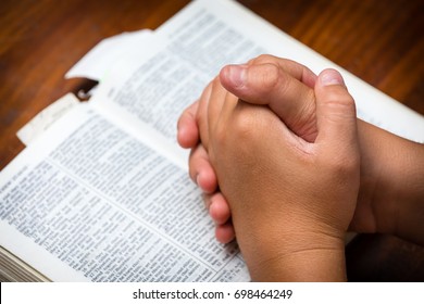 Young Boy Clasping Hands Together Prayer Stock Photo (Edit Now) 698464249