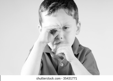Young boy with cold and headache