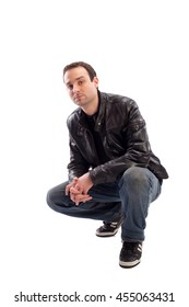 Young Boy Crouching White Background