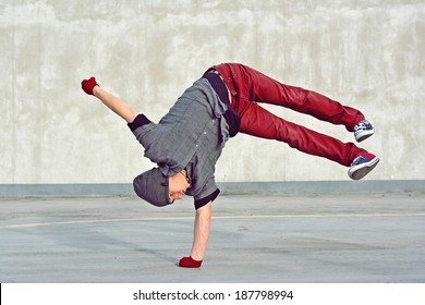 Young Boy Dancing Break Dance On The Street