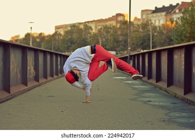 Young Boy Dancing Break Dance On The Street