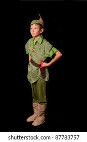 Young boy dressed up in peter pan costume