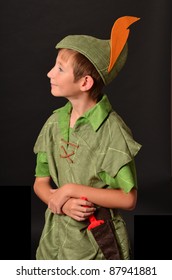 Young boy dressed up in Peter Pan Costume