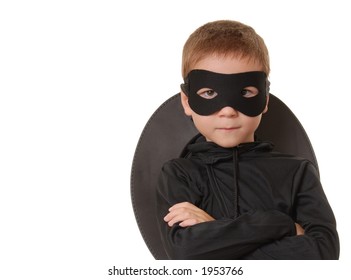 Young boy dressed in Zorro halloween costume