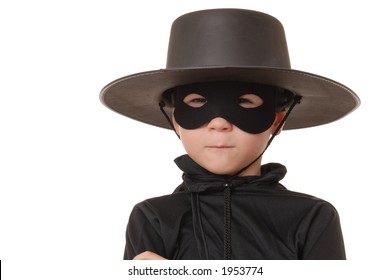 Young boy dressed in Zorro halloween costume