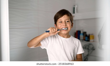 Young boy engaging in tooth brushing routine in a stylish modern bathroom. - Powered by Shutterstock