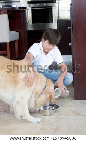 Similar – Foto Bild Junge und sein Hund rennen einen Hügel hinauf