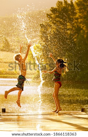 Similar – Boy at the lake