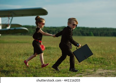 Young Boy And Girl Playing Spy