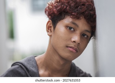 young boy he stay alone and so sad because lockdown  - Shutterstock ID 2027631053