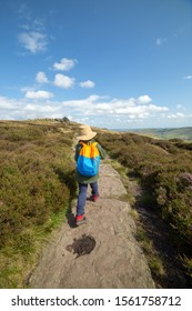 Young Boy Hiking Along The Paved Footpath On The Edges Of Kinder Scout, Edale, Peak District, England, UK