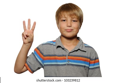 Young Boy Holding Up Three Fingers.