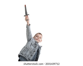 Young boy holding a toy dagger isolated on a white background. - Powered by Shutterstock