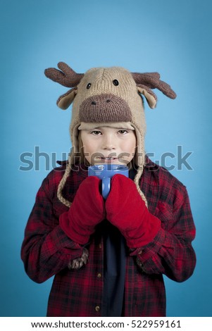 Similar – Foto Bild Junge mit Rentiergeweih vor einem Kamin