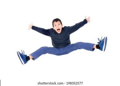 Young Boy Jumping Isolated In White