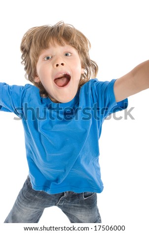 Young boy jumping over white background