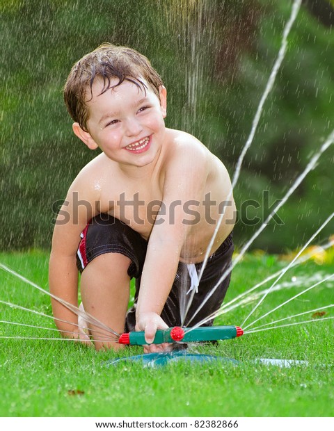 Young Boy Kid Cools Off By Stock Photo 82382866 | Shutterstock