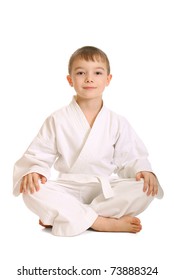 Young boy in kimono over pure white background