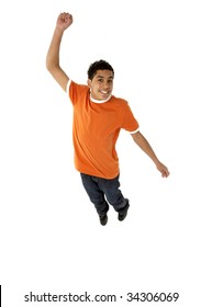 Young Boy Leaping In Studio - Shutterstock ID 34306069