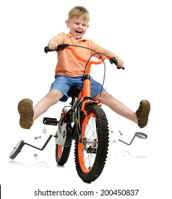 A Young Boy Learning To Ride And Breaking Free From Training Wheels All Isolated On A White Background