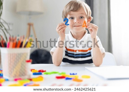 Young Boy Learning Shapes During Homeschooling Session