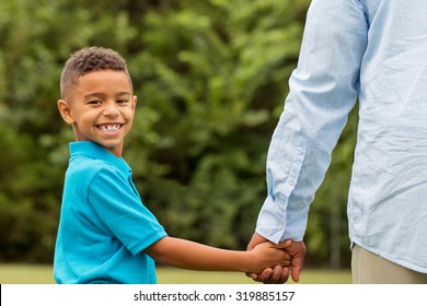 Young Boy Looking Back At The Camera.