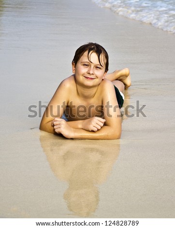 Image, Stock Photo Little boy doing exercise at beach