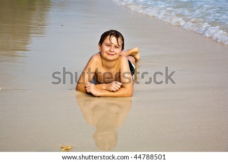 Similar – Image, Stock Photo Little boy doing exercise at beach