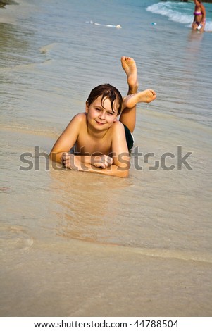 Similar – Image, Stock Photo Little boy doing exercise at beach